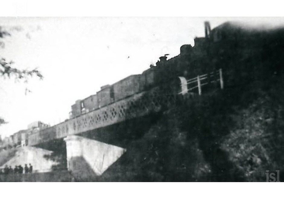 6-septembre-1944-le-train-blinde-allemand-en-feu-sur-le-pont-de-galuzot-photo-dr-1473277798.jpg